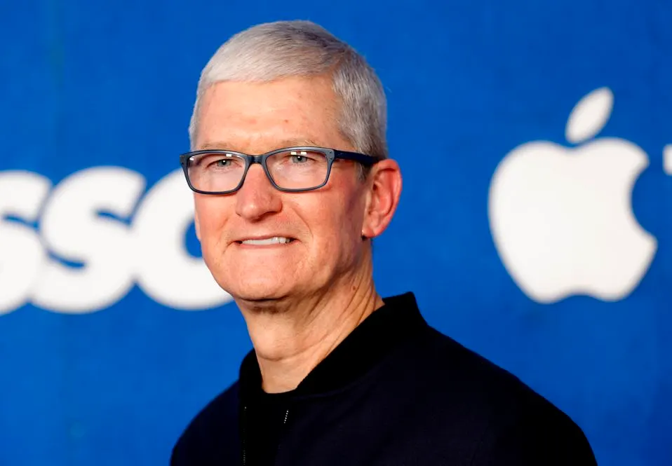 Tim Cook Signals Major AI Push: Apple “Must” Invest and Is Open to Acquisitions